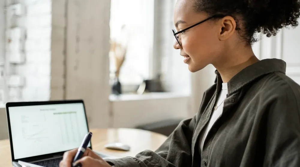 Person using a smartphone to search for a local business listing representing NAP consistency in local SEO