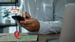 Smartphone showing a business directory listing representing NAP consistency in local SEO